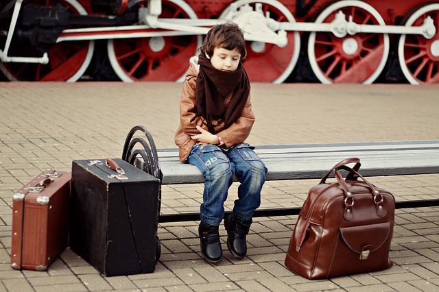 kufry a dítě